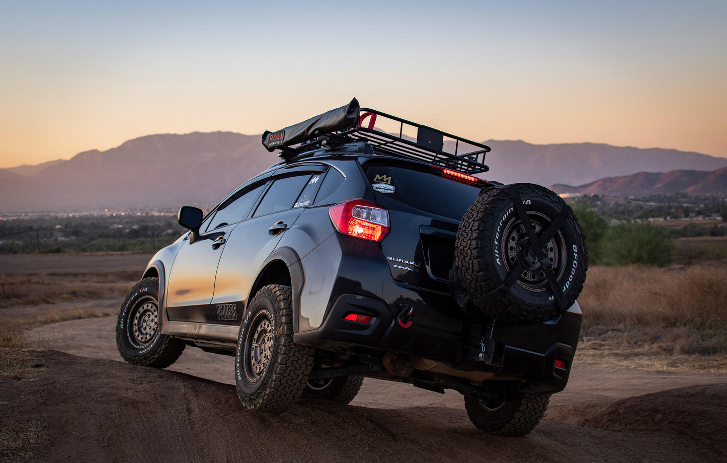 Rooftop awning attached to roof rails of a Subaru Crosstrek